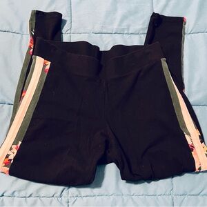 Torrid Black leggings with side stripes. Size 1.